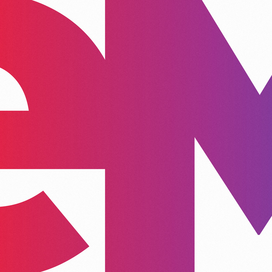 eMAG symbol — red-to-purple gradient monogram letterforms, brand reconstruction by Brandient
