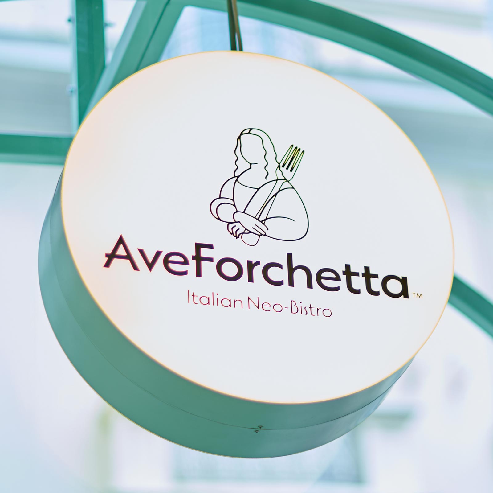 AveForchetta brand identity — round lightbox sign with Mona Lisa fork logo by Brandient