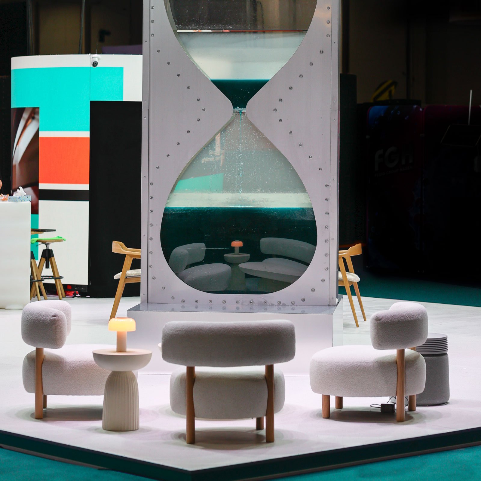 Klarwin ExpoApa 2026 main stand with the Water Countdown hourglass — event branding by Brandient
